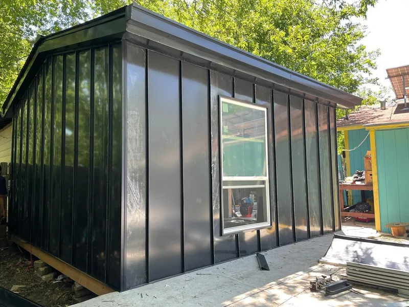 Black standing seam metal wall panels for Roof Inspection in Fairfield Plantation